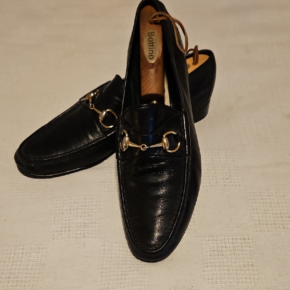 Gucci Black Leather Loafers with Gold Accents